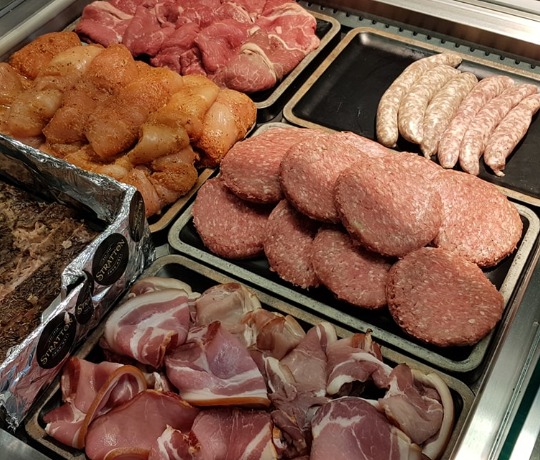 Selection of Stratton Food Halls Butchers Products Trays with sausages, burgers, bacon and marinated chicken